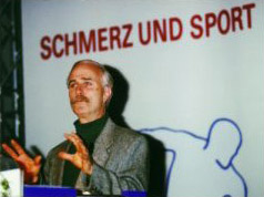 Dr. Jerry Lynch speaking at a conference in Germany